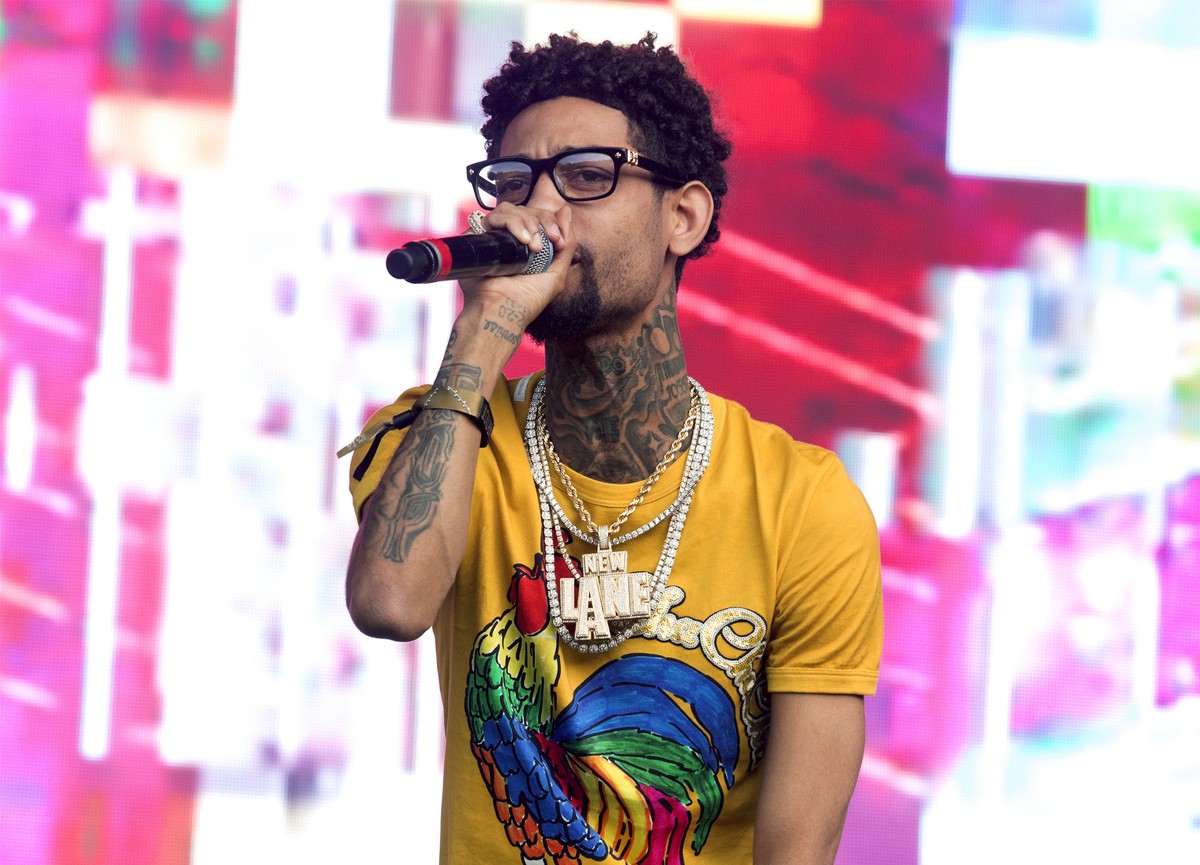 FILE - Philadelphia rapper PnB Rock performs at the 2018 Firefly Music Festival in Dover, Del., on June 16, 2018. The rapper, whose real name is Rakim Allen, was fatally shot during a robbery in South ...