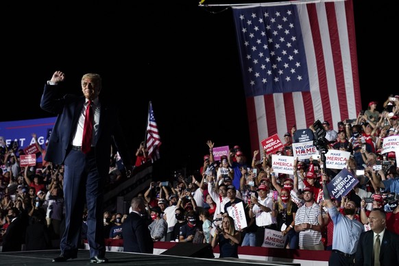 President Donald Trump reacts after speaking at a campaign rally at Orlando Sanford International Airport, Monday, Oct. 12, 2020, in Sanford, Fla. (AP Photo/Evan Vucci)
Donald Trump