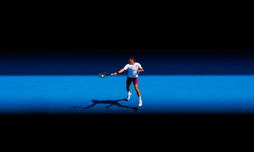 epa08172575 Roger Federer of Switzerland in action during his quarter final match against Tennys Sandgren of the USA at the Australian Open Grand Slam tennis tournament at Rod Laver Arena in Melbourne ...