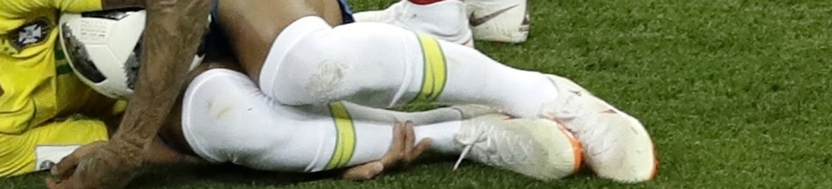 Switzerland's Valon Behrami reacts as Brazil's Neymar lies on the ground during the group E match between Brazil and Switzerland at the 2018 soccer World Cup in the Rostov Arena in Rostov-on ...