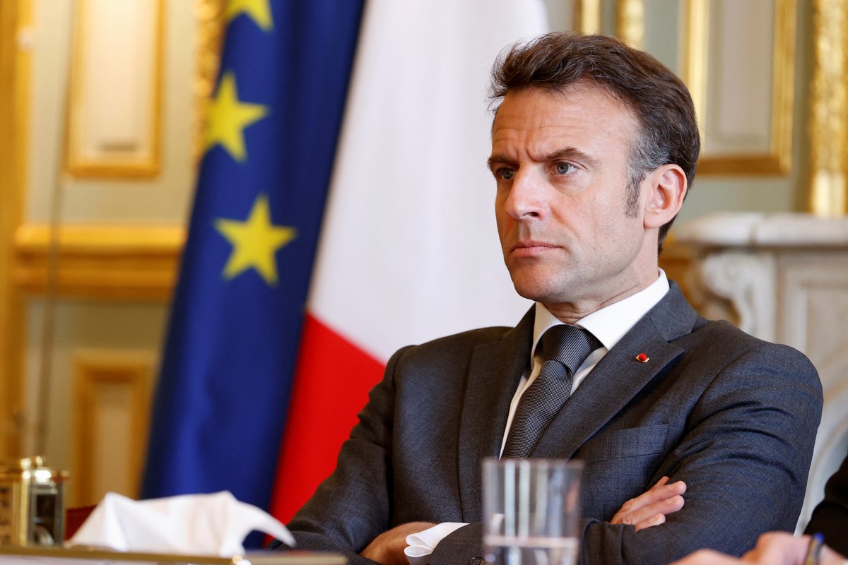 epa10578098 French President Emmanuel Macron attends a meeting with the leaders of the French Employers' association (MEDEF), the CPME and the Union of local businesses, after he signed into law  ...
