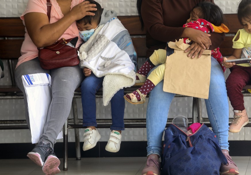 Children with dengue wait their turns to be seen by doctors at the Mario Ortiz Children&#039;s Hospital in Santa Cruz, Bolivia, Thursday, Feb. 16, 2023. (AP Photo/Ipa Ibanez)