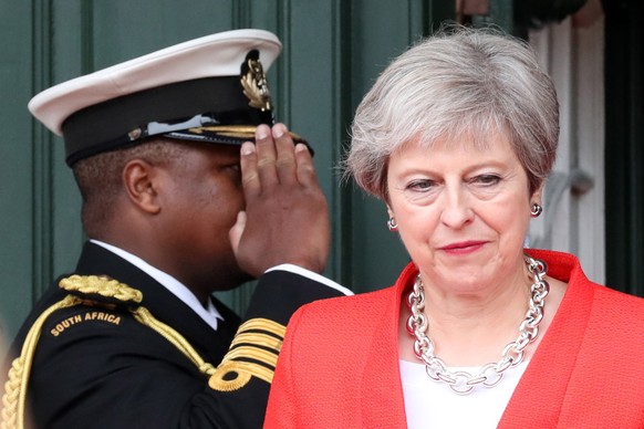 epa06978347 British Prime Minister Theresa May during an official welcoming ceremony in Cape Town, South Africa, 28 August 2018. The visit is the first visit by a British Prime Minister to Sub-Saharan ...