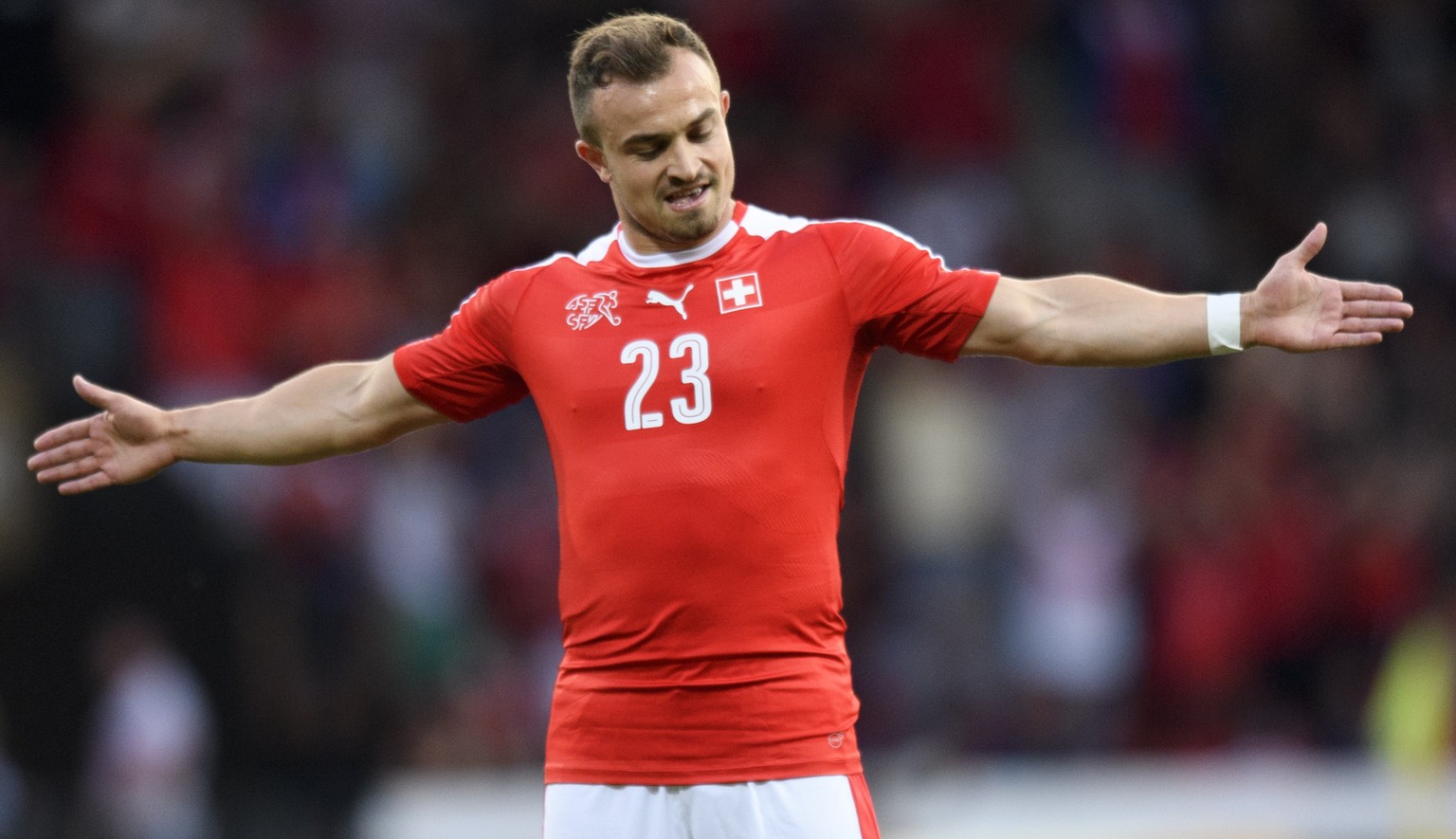 Swiss forward Xherdan Shaqiri celebrates his goal after scoring the firt goal during a friendly soccer match on the side line of the 2018 Fifa World Cup group B qualification between Switzerland and B ...