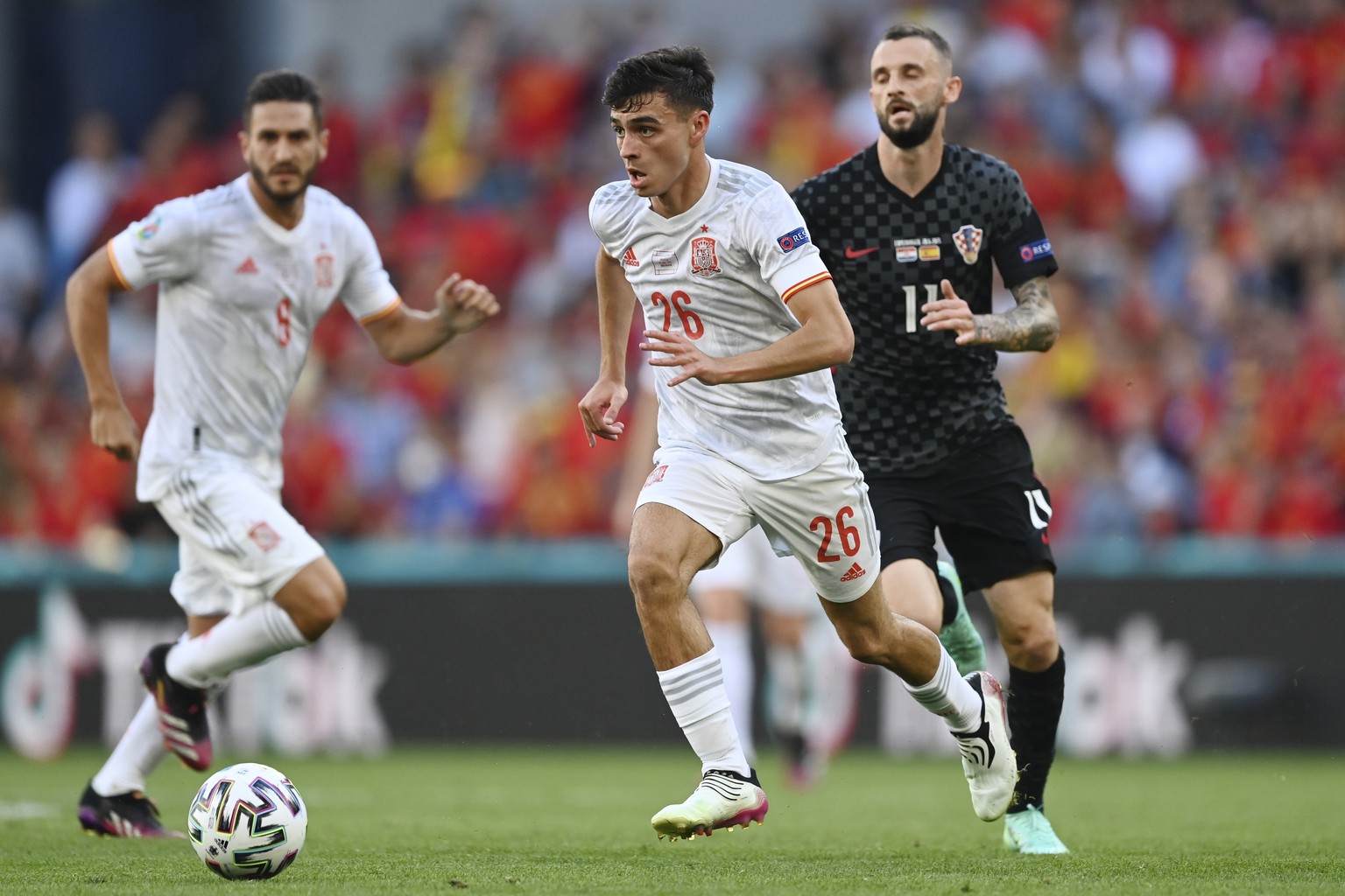 Spain&#039;s Pedri runs with the ball during the Euro 2020 soccer championship round of 16 match between Croatia and Spain at the Parken Stadium in Copenhagen, Monday June 28, 2021. (Stuart Franklin,  ...