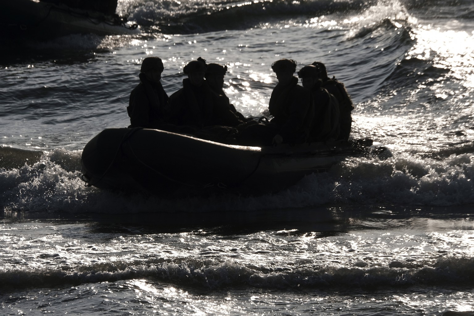 epa10676547 US and British Royal marines participiate in the sea landing operation during exercise BALTOPS near Ventspils, Latvia, 06 June 2023. BALTOPS remains the most significant annual maritime-fo ...