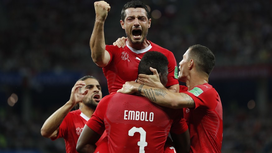 Switzerland&#039;s Blerim Dzemaili, top celebrates after scoring his side&#039;s first goal during the group E match between Switzerland and Costa Rica, at the 2018 soccer World Cup in the Nizhny Novg ...