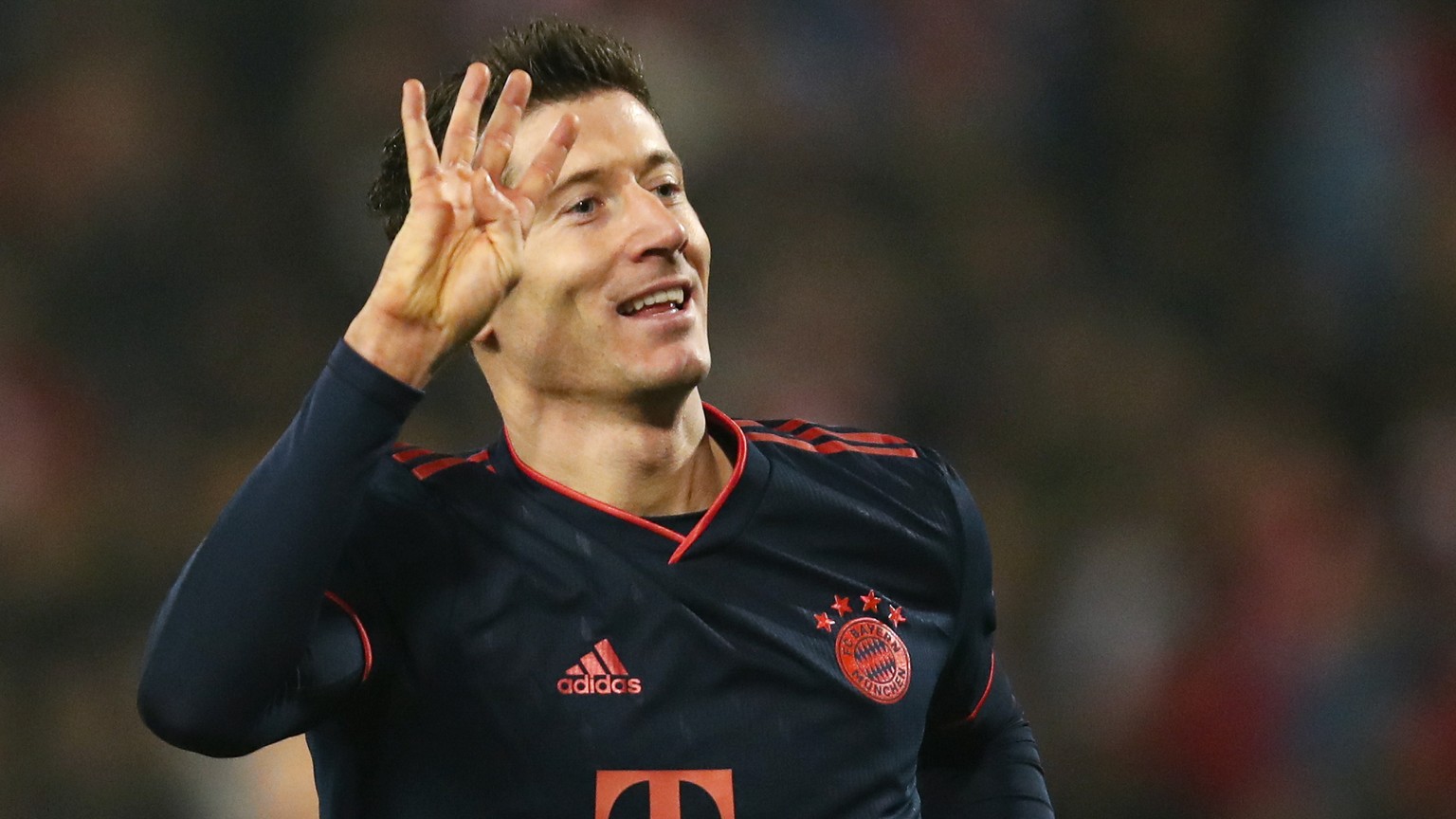 Bayern&#039;s Robert Lewandowski celebrates after scoring his side&#039;s fourth goal during the Champions League group B soccer match between Red Star and FC Bayern Munich at the Rajko Mitic Stadium, ...
