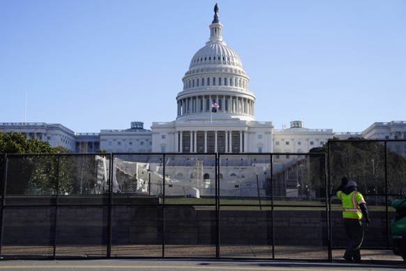epa08925158 Fencing is erected outside the US Capitol, in Washington, DC, USA, 07 January 2021. Members of Congress certified the 2020 Electoral College in the early hours of 07 January following more ...