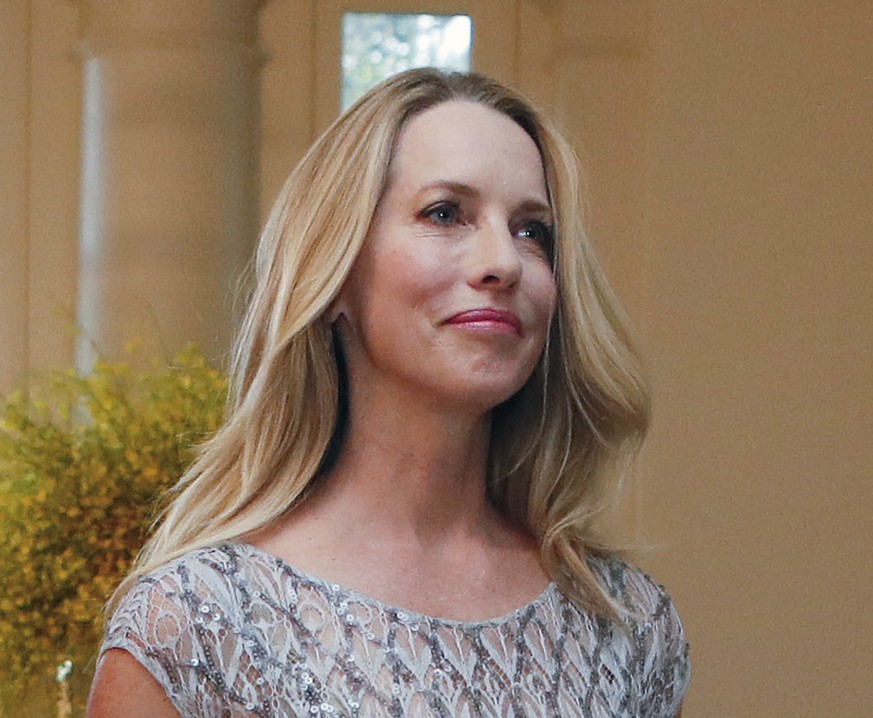 FILE - In this Aug. 2, 2016, file photo, Laurene Powell Jobs arrives for a State Dinner at the White House in Washington. Billionaire executive Laurene Powell Jobs has agreed to buy a 20 percent stake ...