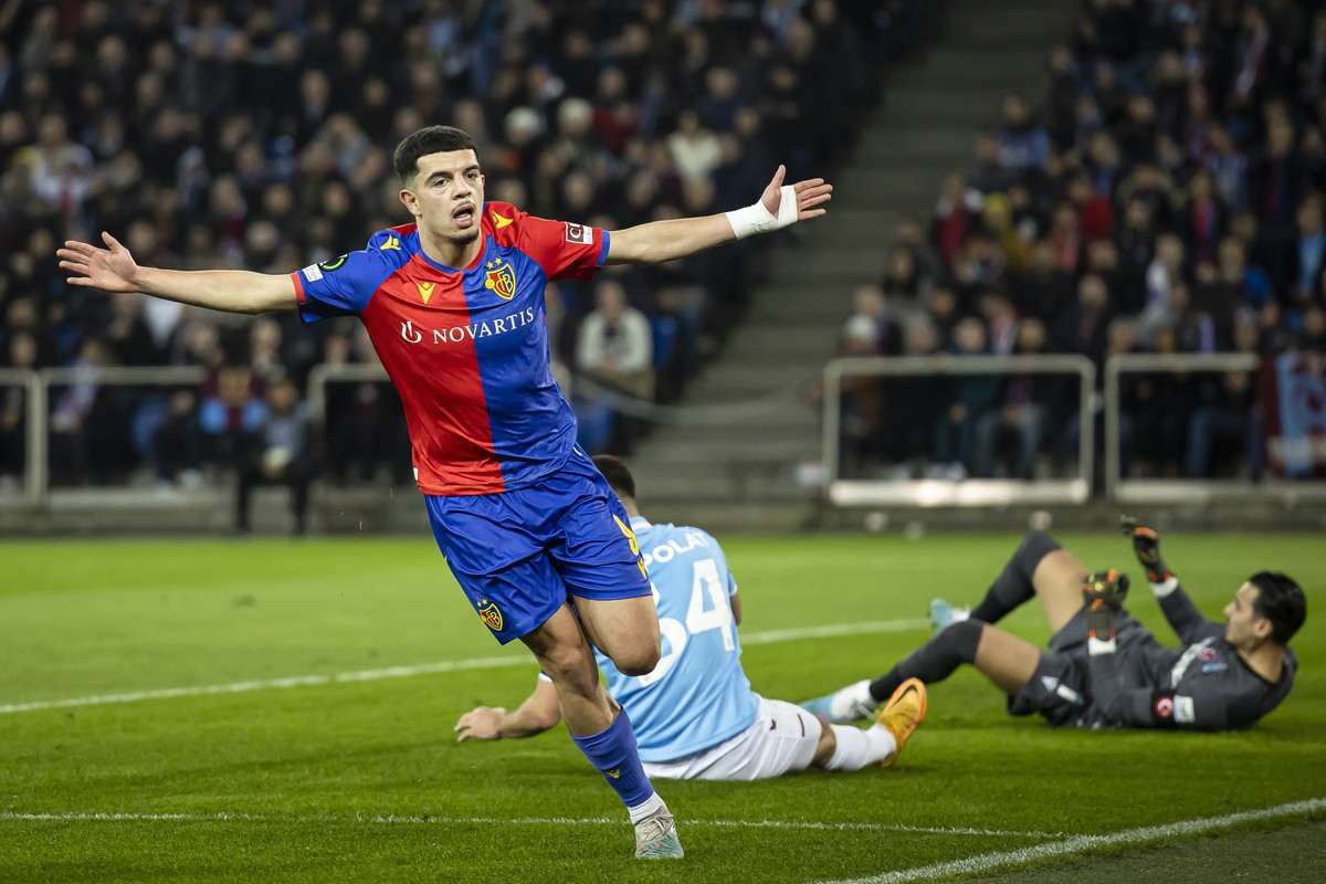 epa10486459 Basel's Zeki Amdouni (L) reacts after scoring the first goal for his team during the UEFA Europa Conference League play-off second leg soccer match between Switzerland's FC Basel ...