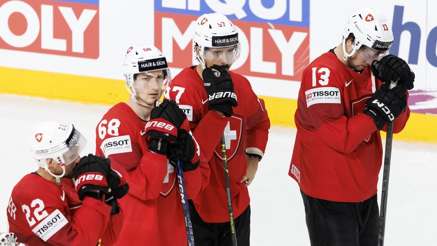 Switzerland&#039;s forward Nino Niederreiter #22, Switzerland&#039;s forward Fabrice Herzog #68 Switzerland&#039;s defender Jonas Siegenthaler #97 and Switzerland&#039;s forward Nico Hischier #13, loo ...