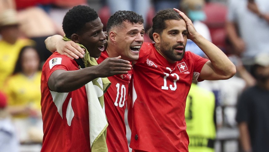 260708 -- VANCOUVER, July 8, 2026 -- Granit Xhaka C and Ricardo Rodriguez R of Switzerland celebrate victory after winning the round of 16 match between Switzerland and Colombia at the 2026 FIFA World ...