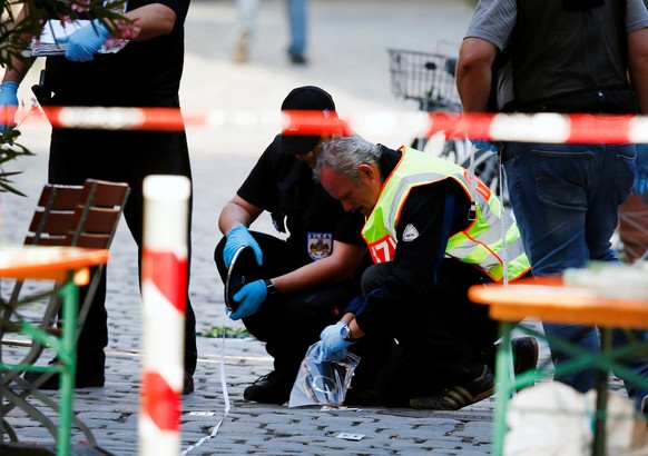 Police secure the area after an explosion in Ansbach, Germany, July 25, 2016. REUTERS/Michaela Rehle