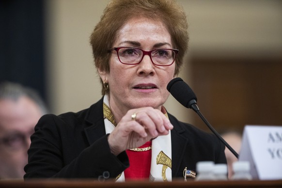 epa08000157 Former US Ambassador to Ukraine Marie Yovanovitch arrives to testify during the House Permanent Select Committee on Intelligence hearing on the impeachment inquiry into US President Donald ...