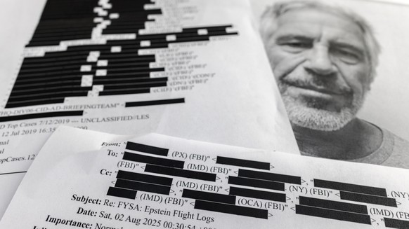 epa12724191 (ILLUSTRATION) - Printed copies of the Jeffrey Epstein files in Miami, Florida, 10 February 2026. According to official charges and court records released under the Epstein Files Transpare ...
