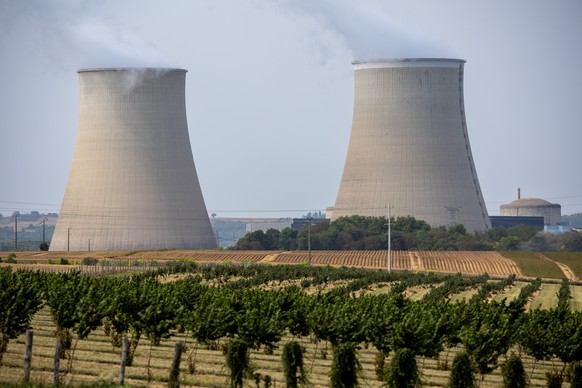 epa12298779 A view of the cooling towers at the Nogent-sur-Seine nuclear power plant, operated by the French energy company EDF (Electricite de France), in Nogent-sur-Seine, 100 km east of Paris, Fran ...