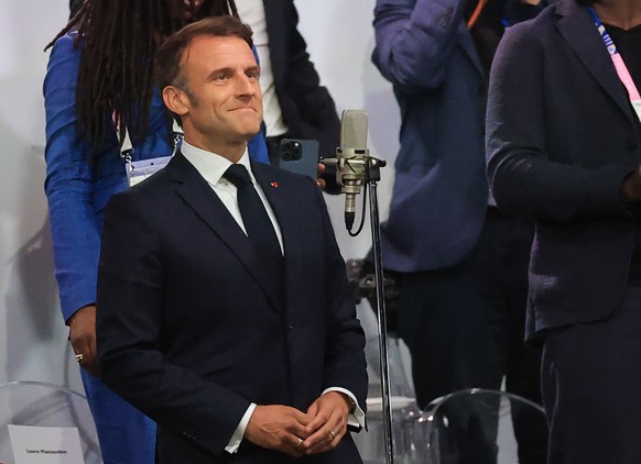 epa11498102 French President Emmanuel Macron declares the Games open at Trocadero during the Opening Ceremony of the Paris 2024 Olympic Games, in Paris, France, 26 July 2024. EPA/MARTIN DIVISEK