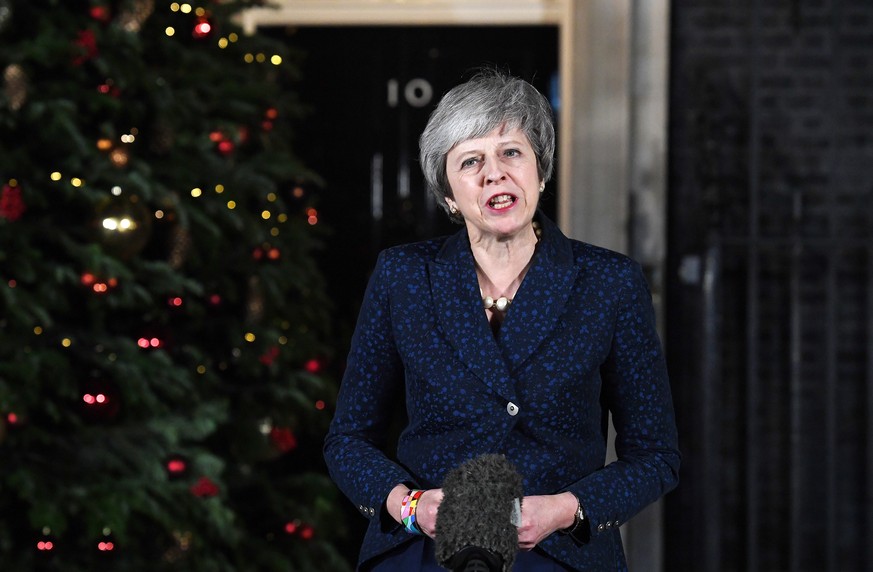 epa07227015 British Prime Minister Theresa May gives a statement outside 10 Downing Street after a Confidence Vote in London, Britain, 12 December 2018. Theresa May won a challenge to her leadership o ...