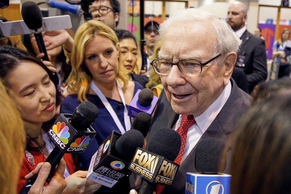 FILE - Warren Buffett, Chairman and CEO of Berkshire Hathaway, speaks to reporters before presiding over the annual shareholders meeting in Omaha, Neb., May 4, 2019. (AP Photo/Nati Harnik, File)
Warre ...