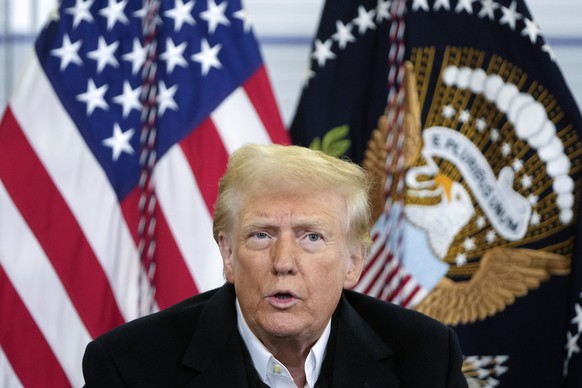 President Donald Trump is briefed on the effects of Hurricane Helene at Asheville Regional Airport in Fletcher, N.C., Friday, Jan. 24, 2025. (AP Photo/Mark Schiefelbein)
Donald Trump