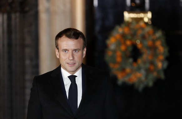 French President Emmanuel Macron leaves 10 Downing Street after a meeting in London, Tuesday, Dec. 3, 2019. U.S. President Donald Trump and his NATO counterparts were gathering in London Tuesday to ma ...