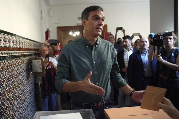 Spain&#039;s Prime Minister and Socialist Workers&#039; Party Pedro Sanchez gestures as his ballot is introduced in the ballot box during Spain&#039;s general election in Madrid, Spain, Sunday July 23 ...