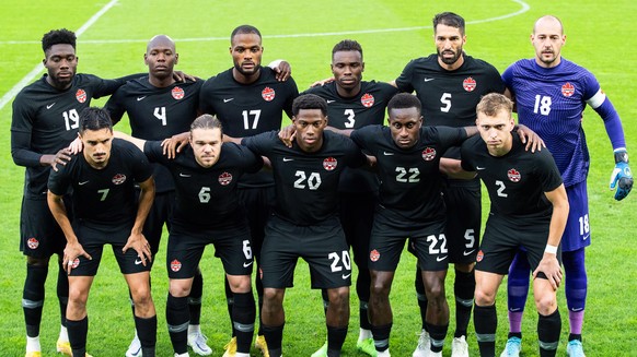 epa10254003 Players of Canada line up for the International Friendly soccer match between Canada and Uruguay in Bratislava, Slovakia, 27 September 2022. Back from L: Alphonso Davies, Kamal Miller, Cyl ...
