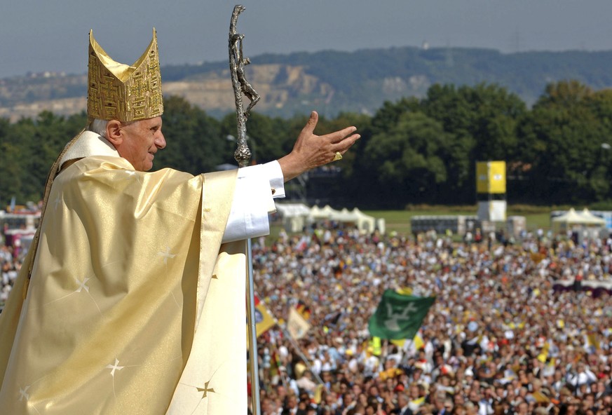 FILE - Pope Benedict XVI waves to the crowd at the end of a papal Mass at the Islinger field in Regensburg, southern Germany, some 120 kilometers (about 75 miles) northeast of Munich, on Tuesday, Sept ...