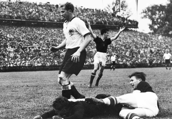 FILE - A final moment of the 1954 World Cup soccer tournament Final on July 4, 1954, when Hungarian captain Ferenc Puskas, on the ground right, thought he had scored a goal that was later disallowed,  ...