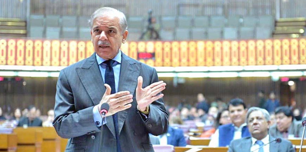epa12523579 A handout picture made available by the Press Information Department (PID) shows Prime Minister Shehbaz Sharif attending a parliament session as it votes on the 27th constitutional amendme ...