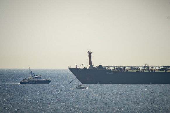 A view of the Grace 1 super tanker near a Royal Marine patrol vessel in the British territory of Gibraltar, Thursday, July 4, 2019. Spain&#039;s acting foreign minister says a tanker stopped off Gibra ...