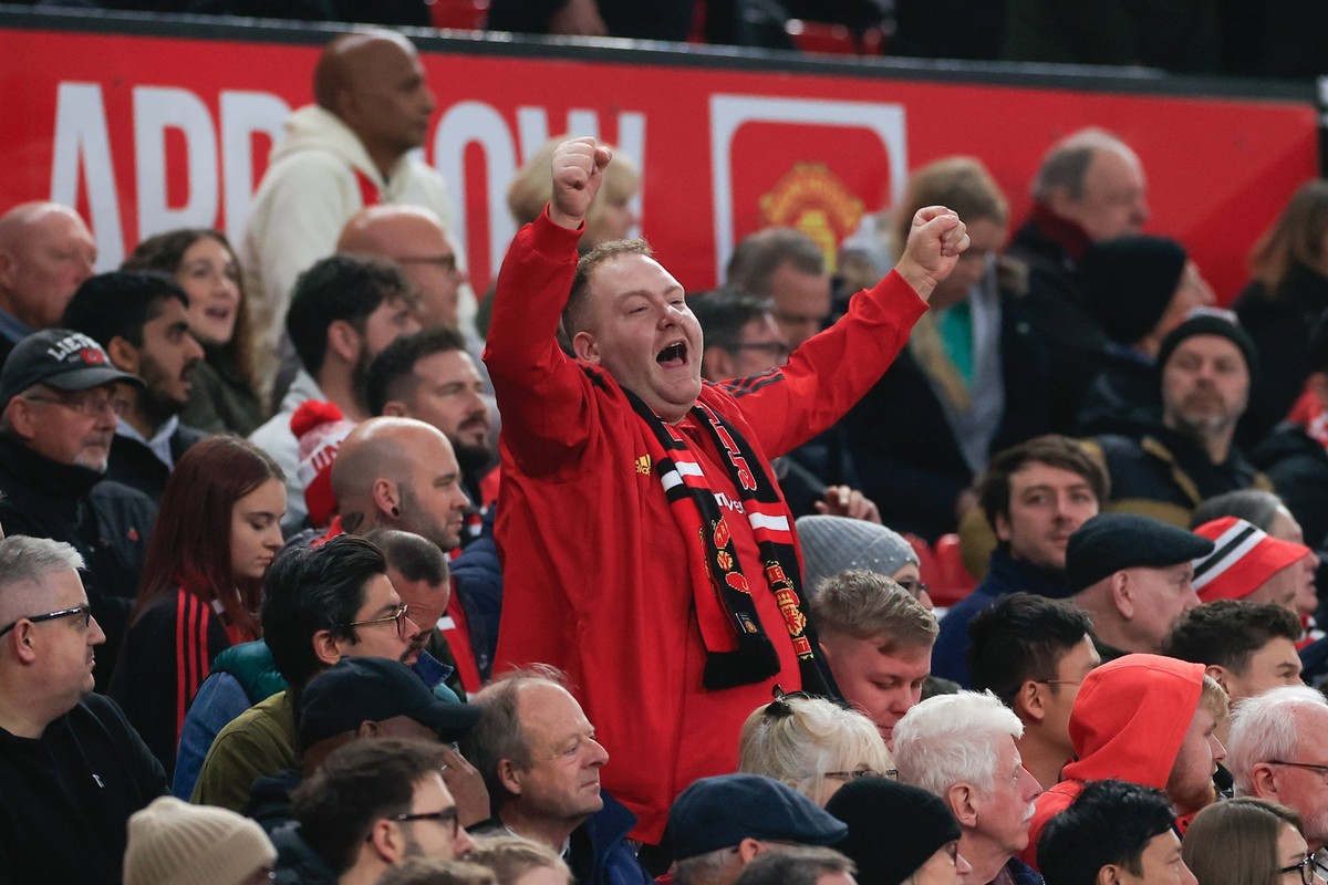 Manchester United, ManU v Leicester City Premier League 10/11/2024. A United fan celebrates the 3-0 victory during the Premier League match between Manchester United and Leicester City at Old Trafford ...