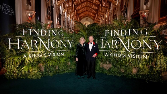 Britain's King Charles III and Queen Camilla attend the premiere of Finding Harmony: A King's Vision, at Windsor Castle in Berkshire, England, Wednesday, Jan. 28, 2026. (Aaron Chown/PA via A ...