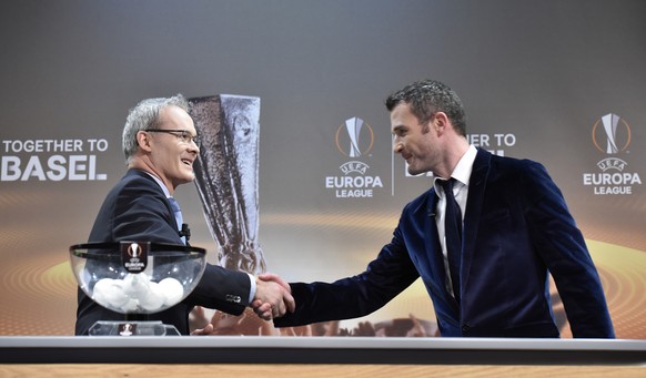 CORRECTS DATE AND PERSONS NAME --- UEFA Competitions Director Giorgio Marchetti, left, and Alex Frei, right, Ambasador for the final Europa leage, during the draw of the UEFA Europa League 2015-16 qua ...