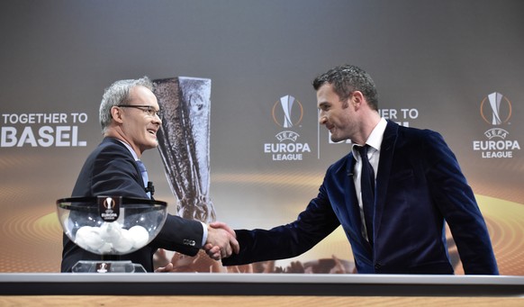 CORRECTS DATE AND PERSONS NAME --- UEFA Competitions Director Giorgio Marchetti, left, and Alex Frei, right, Ambasador for the final Europa leage, during the draw of the UEFA Europa League 2015-16 quarter final matches at the UEFA Headquarters in Nyon, Switzerland, Friday, March 18, 2016. (KEYSTONE/Christian Brun)