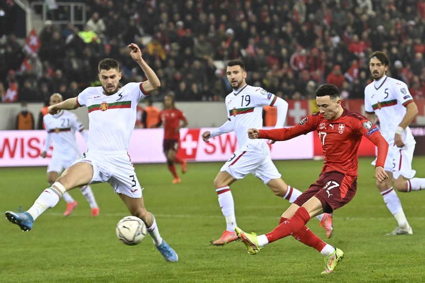 Switzerland&#039;s midfielder Ruben Vargas, right, scores the second goal in front of Bulgaria&#039;s defender Andrea Hristov, left, during the 2022 FIFA World Cup European Qualifying Group C match be ...