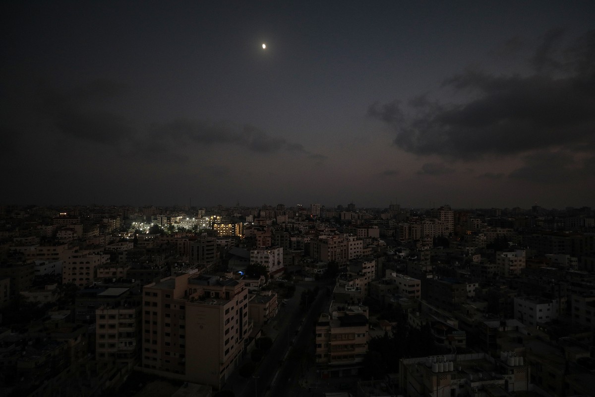 epa10962791 Al Shifa hospital is lit up in Gaza City 24 October 2023. (Issued 07 November 2023). 07 November 2023, marks one month since Hamas militants launched an attack against Israel from the Gaza ...