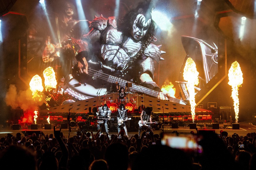 FILE - Gene Simmons, from left, Eric Singer, Paul Stanley and Tommy Thayer of KISS perform at the Riverbend Music Center in Cincinnati on Aug. 29, 2019. The band&#039;s final two shows are scheduled f ...