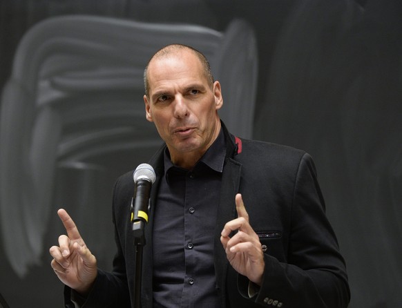 epa05011090 The economist and former Greek Finance Minister, Yanis Varoufakis speaks to the audience as he takes part in a panel discussion entitled &#039;Money and Power, Flooding Europe with Democra ...