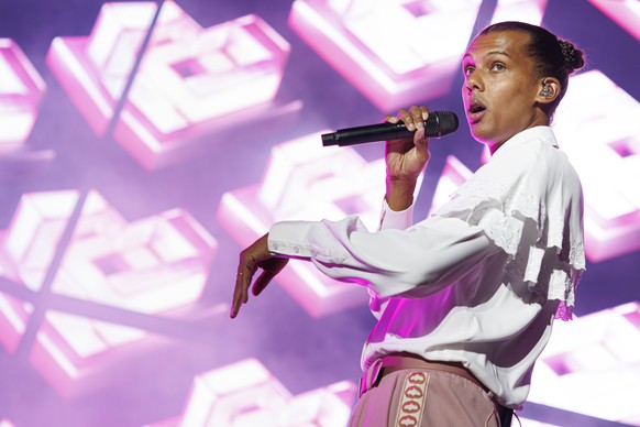 epa10090397 Belgian singer Stromae performs on the main stage during the 45th edition of the Paleo Festival, in Nyon, Switzerland, 24 July 2022. The Paleo is the largest open-air music festival in the ...