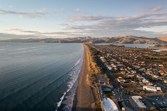 RECORD DATE NOT STATED An aerial drone shot during sunrise at New Brighton beach, Christchurch, South Island, New Zealand *** An&amp;Verkauf aerial Drohne erschossen w