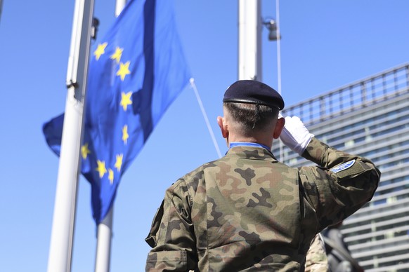An Eurocorps soldier salutes the European flag during a ceremony marking the 80th anniversary of the end of WWII in Europe, Wednesday, May 7, 2025 at the European Parliament in Strasbourg, eastern Fra ...