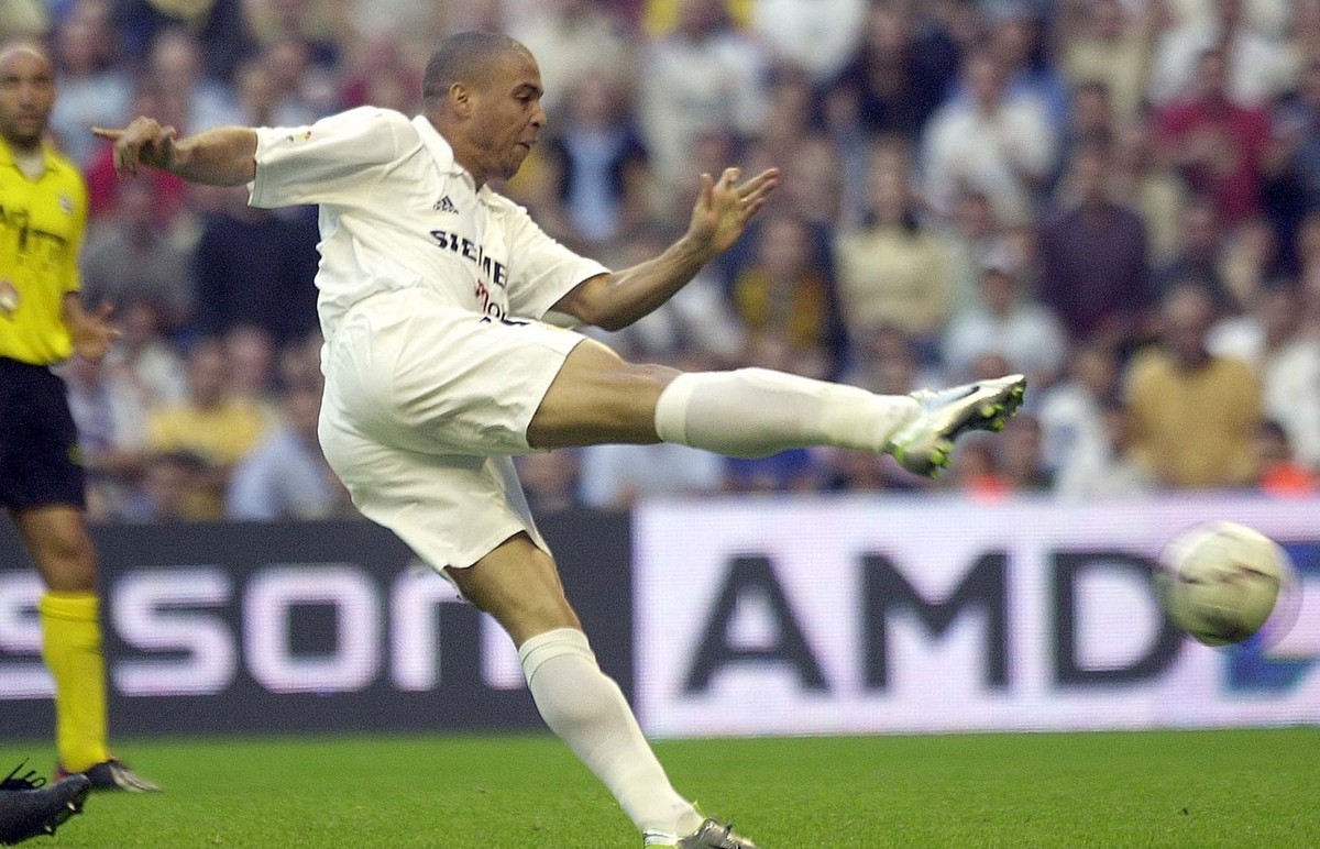 Real Madrid's Brazilian star Ronaldo scores his first goal on his debut against Alaves during a Spanish league soccer match in Madrid's Bernabeu stadium, Spain, Sunday Oct. 6, 2002. (AP Phot ...