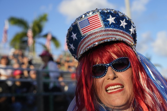 People arrive before former President Donald Trump speaks at a campaign rally in Hialeah, Fla., Wednesday, Nov. 8, 2023. (AP Photo/Lynne Sladky)