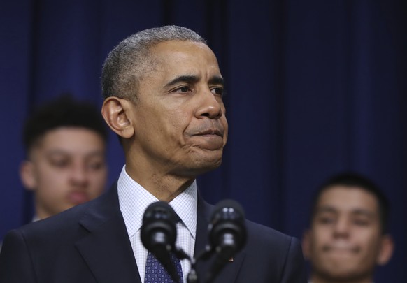 President Barack Obama pauses during a &quot;My Brother&#039;s Keeper&quot; summit in South Court Auditorium at the Eisenhower Executive Office Building on the White House complex in Washington, Wedne ...