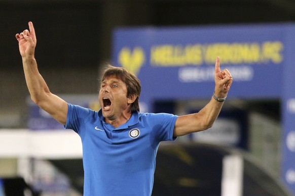 Inter Milan manager Antonio Conte shouts toward players during the Serie A soccer match between Hellas Verona and Inter Milan, at the Marcantonio Bentegodi Stadium in Verona, Italy, Thursday, July 9,  ...