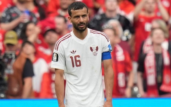 Canada v Qatar - FIFA World Cup, WM, Weltmeisterschaft, Fussball 2026 - Group B VANCOUVER, CANADA - JUNE 18: Boualem Khoukhi 16 of Qatar reacts after conceding a goal during the 2026 FIFA World Cup Fi ...