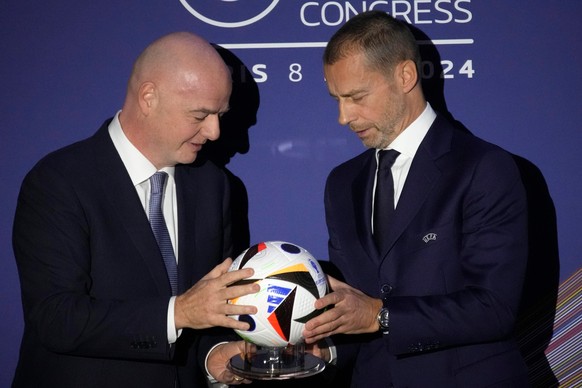 FILE - UEFA President Aleksander Ceferin, right, and FIFA President Gianni Infantino pose during the 48th UEFA congress in Paris, Thursday, Feb. 8, 2024. (AP Photo/Christophe Ena, File)
WCup FIFA Inve ...