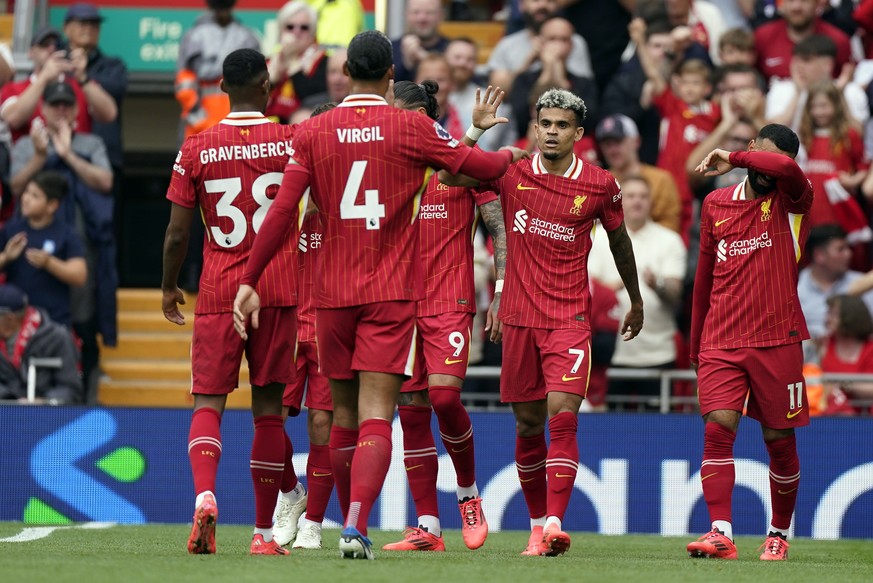 epa11617490 Luis Diaz of Liverpool (2-R) celebrates with his teammates after scoring a goal during the English Premier League match between Liverpool and AFC Bournemouth in Liverpool, Britain, 21 Sept ...
